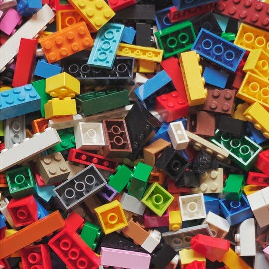 Pile of multi-colored Lego bricks.