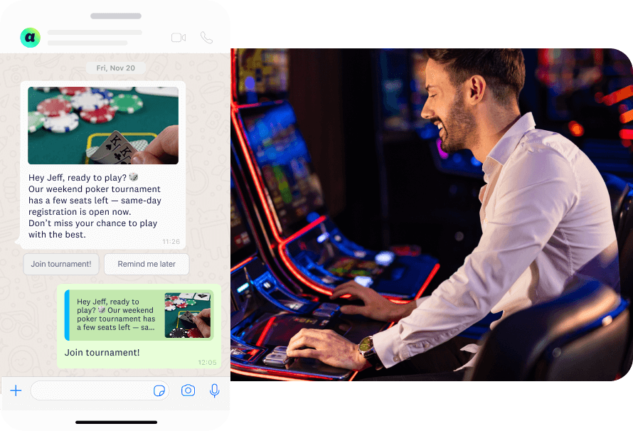 Man at a casino gaming machine using his phone