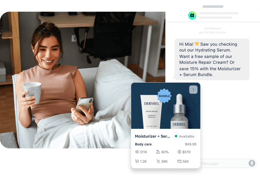 Smiling woman on couch reads a SMS message about a skincare bundle deal and free sample on her phone
